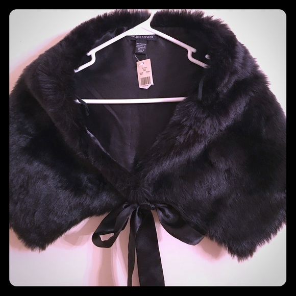 Faux fur wrap with satin bow tie closure. NWT